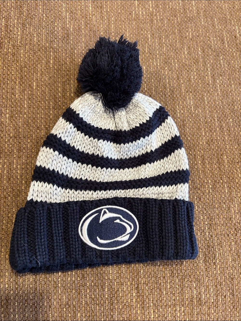 New Era Navy and White Striped Pom Beanie with Logo